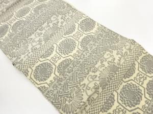 横段に花唐草・花々・紗綾型模様織出し名古屋帯